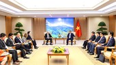 Thủ tướng Phạm Minh Chính tiếp đoàn DN của Hội đồng Kinh doanh Hoa Kỳ-ASEAN hồi tháng 12-2022. Ảnh: TTXVN