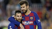 Gerard Pique và Leo Messi