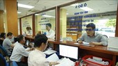 Hoạt động tại Cục Thuế Hà Nội. (Ảnh: TTXVN phát)