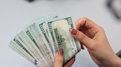 Khi lộ trình tăng lãi suất của Fed chậm lại, triển vọng về đồng USD không còn hấp dẫn như trước nên mức độ ảnh hưởng lên tỷ giá trong nước cũng sẽ giảm dần. (Ảnh: Vietnam+)