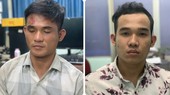 Đối tượng Công và Bảo (từ trái qua phải) tại cơ quan Công an. Ảnh: CHÍ THẠCH
