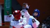 Trương Thị Kim Tuyền (xanh) vẫn là gương mặt quan trọng nhất của taekwondo nữ Việt Nam. Ảnh: DŨNG PHƯƠNG