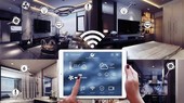 With a tablet, the owner of a domotics can easily monitor and control smart devices in his or her house.