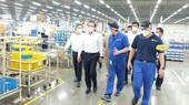 Secreatry of HCMC Party Committee Nguyen Van Nen paid a visit to Nissei Electric Vietnam Co. Ltd – one of the enterprise with a strong Party organization. (Photo: SGGP)