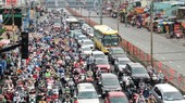 Traffic congestion on National Way No.13. (Photo: SGGP)