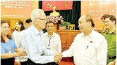 State President Nguyen Xuan Phuc is talking with voters