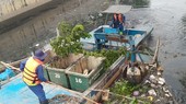 Waste pickup in the section passing Tan Phu District of Tan Hoa – Lo Gom Canal