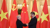 阮富仲總書記與中國國家主席習近平親切握手。