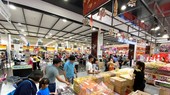 Sweetmeat for Tet holidays sold at a supermarket. (Photo: SGGP)