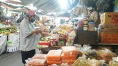 Districts reopen traditional markets cautiously