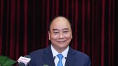 President Nguyen Xuan Phuc addresses the working session with Da Nang and Quang Nam. (Photo: VNA)