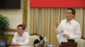 Deputy Prime Minister Vu Duc Dam speaks at the meeting. (Photo: SGGP)