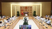 At the meeting (Photo: VNA)