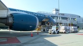 The batch of medical products is brought on the plane at San Francisco International Airport.
