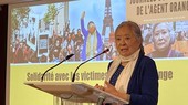 Vietnamese French woman Tran To Nga speaks at the meeting (Photo: VNA)