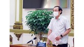 Secretary of the HCMC Party Committee Nguyen Van Nen speaks at the conference.