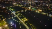 Seven giant lotus-shaped paper lanterns are lighted up on the Huong River.