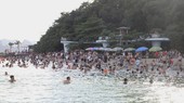 Tourists visit Ha Long Bay in July.