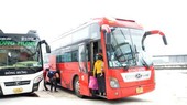 Passengers get on a bus at the new Eastern Coach Station.