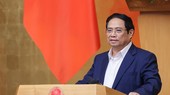 PM Pham Minh Chinh speaks at the meeting. (Photo: VNA)