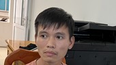 Dương tại cơ quan công an. Ảnh: ĐẠT NHÂN
