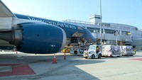 The batch of medical products is brought on the plane at San Francisco International Airport.