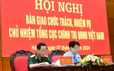 Đại tướng Lương Cường và Thượng tướng Trịnh Văn Quyết tại hội nghị bàn giao. Nguồn: QĐND