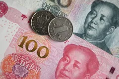 Tiền giấy và tiền xu của Trung Quốc. Ảnh: Sputnik