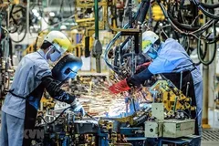 Dây chuyền hàn khung xe ôtô tại Công ty ôtô Toyota Việt Nam, vốn đầu tư của Nhật Bản tại Vĩnh Phúc. (Ảnh: Danh Lam/TTXVN)