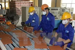 Gạch không nung làm từ xỉ than. (Ảnh: Nguyễn Thanh/TTXVN)