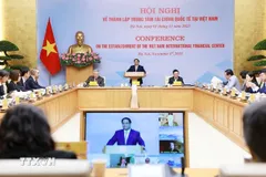 Thủ tướng Phạm Minh Chính chủ trì Hội nghị tham vấn các chuyên gia, tổ chức trong nước và quốc tế về thành lập Trung tâm tài chính quốc tế tại Việt Nam. (Ảnh: Dương Giang/TTXVN)