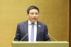 Bộ trưởng Bộ Tài chính Nguyễn Văn Thắng trình Quốc hội dự thảo Nghị quyết thí điểm một số cơ chế, chính sách đặc thù phát triển thành phố Hải Phòng. Ảnh: QUANG PHÚC