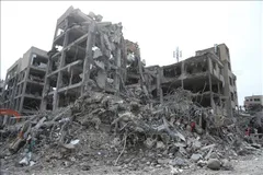 Những tòa nhà bị phá hủy sau các cuộc tấn công tại Tehran ngày 12-3. Ảnh: THX/TTXVN