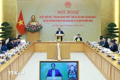 Thủ tướng Phạm Minh Chính chủ trì Hội nghị sơ kết triển khai “Chiến dịch Quang Trung” xây dựng nhà ở cho nhân dân có nhà bị thiệt hại do bão, lũ tại khu vực miền Trung. (Ảnh: Dương Giang/TTXVN)