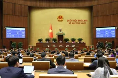 Các đại biểu Quốc hội đã biểu quyết thông qua Nghị quyết về kế hoạch tài chính 5 năm giai đoạn 2026 - 2030; kế hoạch vay, trả nợ công giai đoạn 2026 - 2030 với tỷ lệ tán thành 96,8%. Ảnh: QUANG PHÚC