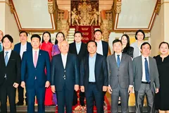 Delegates of the two sides attend the event. (Photo: SGGP)