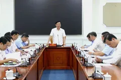 Chairman of the HCMC People’s Council Vo Van Minh chairs the meeting. (Photo: SGGP)