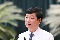 Chairman of the Ho Chi Minh City People’s Council Vo Van Minh delivers his speech at the meeting. (Photo: SGGP)