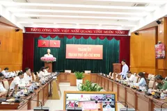 Delegates attend the meeting via the Ho Chi Minh City venue. (Photo: SGGP)