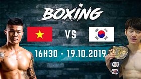Vietnamese boxer Truong Dinh Hoang (L) and Korean rival Lee Gyu-hyun (Photo: bongdaplus.vn)