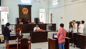 Bui Van Sang, 36, stands his trial at the People’s Court in Thu Duc District, Ho Chi Minh City yesterday (Photo: SGGP)