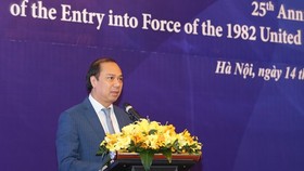 Deputy Foreign Minister Nguyen Quoc Dung addresses the ceremony in Hanoi on November 14 (Photo: VNA)