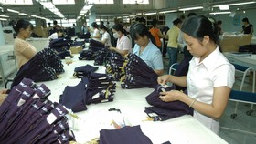 Dệt may chưa tận dụng được nhiều lợi thế của FTA để xuất khẩu. Ảnh: THÀNH TRÍ