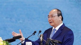 Prime Minister Nguyen Xuan Phuc delivers a speech at the national conference in Nam Dinh province on October 19 (Photo:VNA)