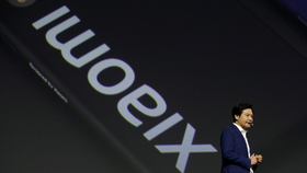 Người sáng lập và CEO của Xiaomi Lei Jun tham dự lễ ra mắt điện thoại hàng đầu mới Xiaomi Mi 9 vào tháng 2 tại Bắc Kinh. REUTERS / Jason Lee.