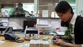 NHNN hạ lãi suất tiền gửi dự trữ bắt buộc