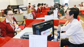 Several banks concentrate capital for business loans at the end of the year to ensure credit quality. (Photo: SGGP)