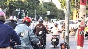 Beggars and the homeless on HCM City's main streets often fabricate stories about their personal circumstances. (Photo courtesy of sggp.org.vn)