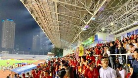 Vietnamese football fans suport the national football team in the Philippines.