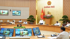 Thường trực Chính phủ họp về chống dịch. Ảnh: QUANG PHÚC